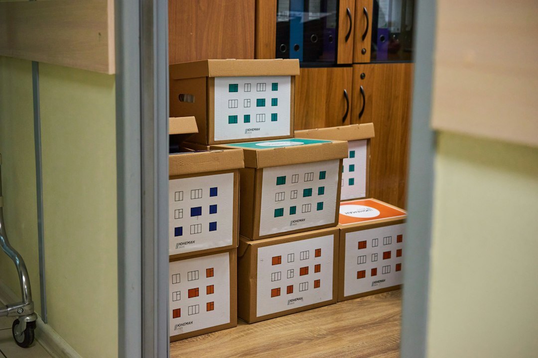 Archive room with boxes of advertising reels and printed campaign materials