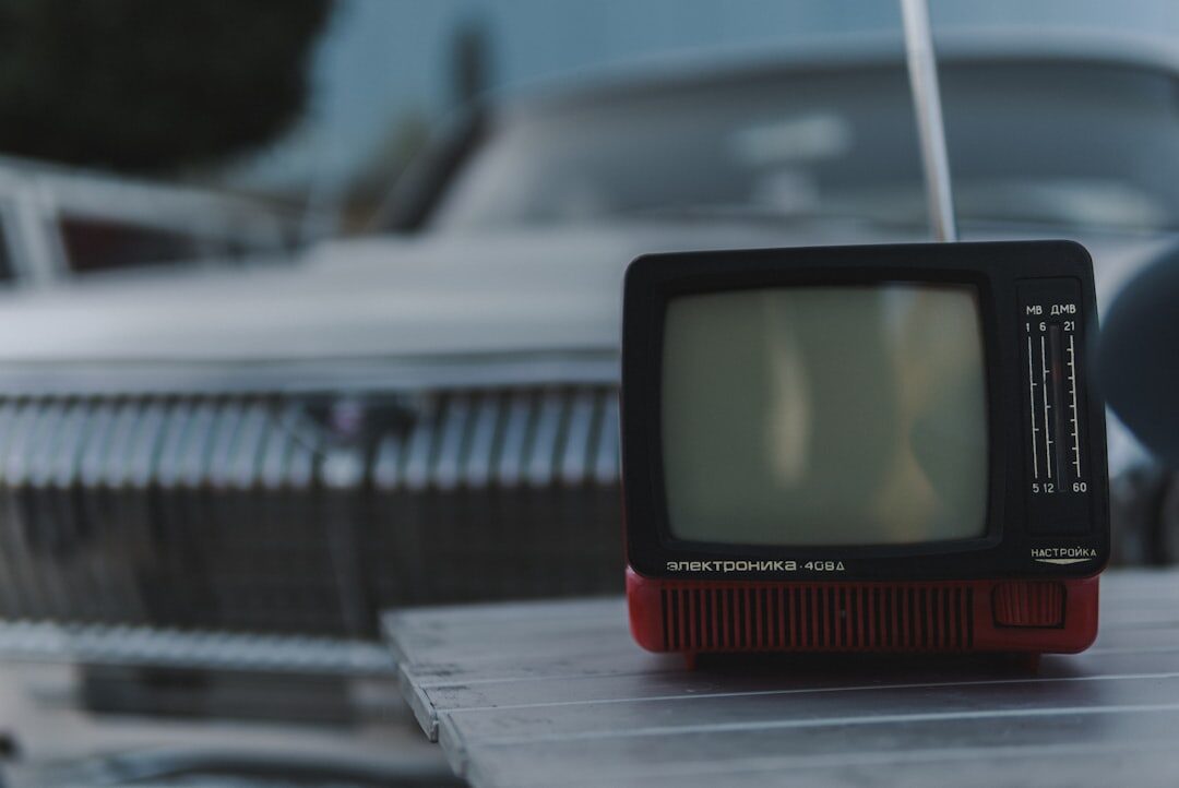 Vintage television broadcasting an advertisement in a Swiss living room in the 1980s